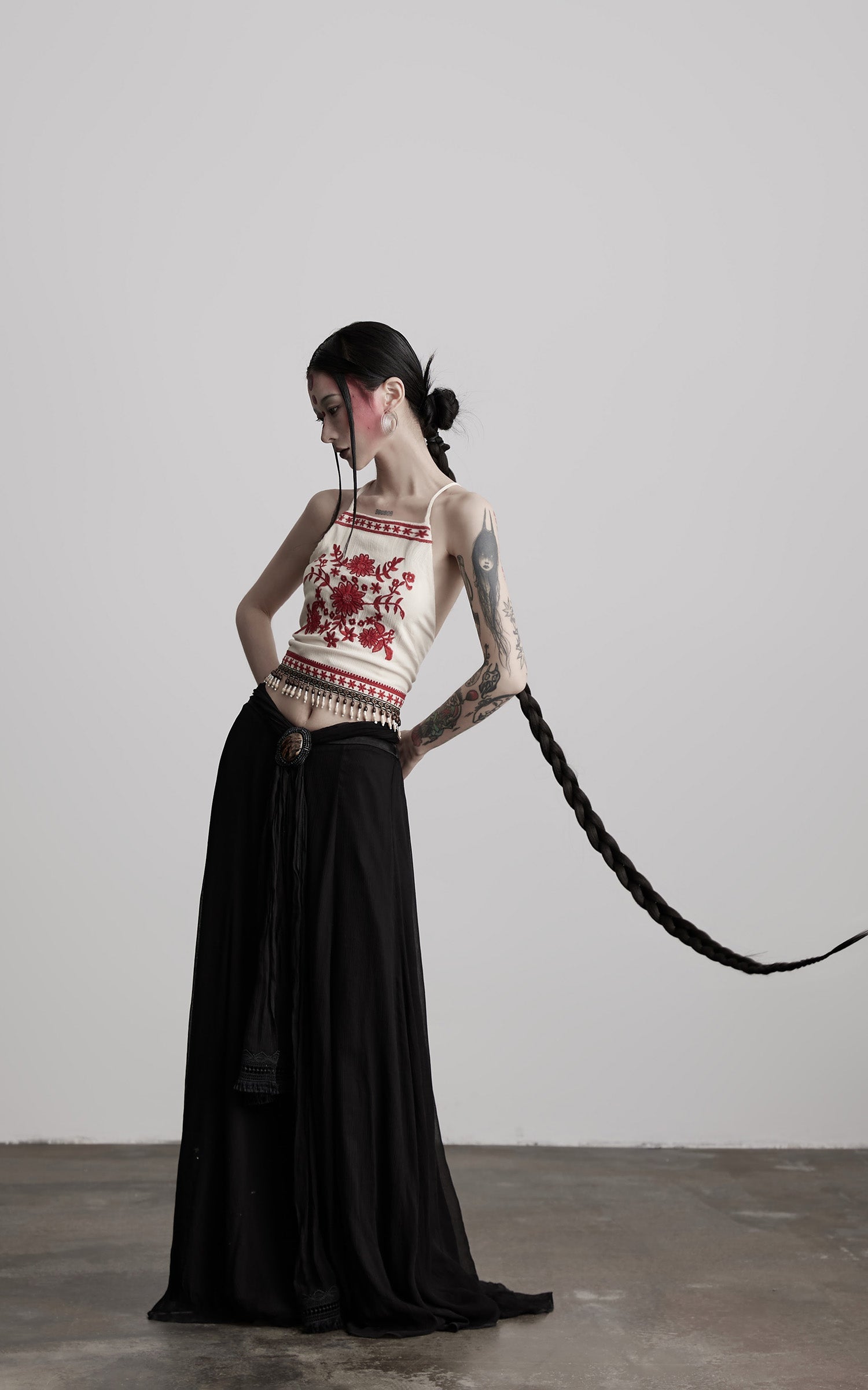 DOINDULGE Embroidered Halter Top with Floral Motif and Beaded Hem Detailing