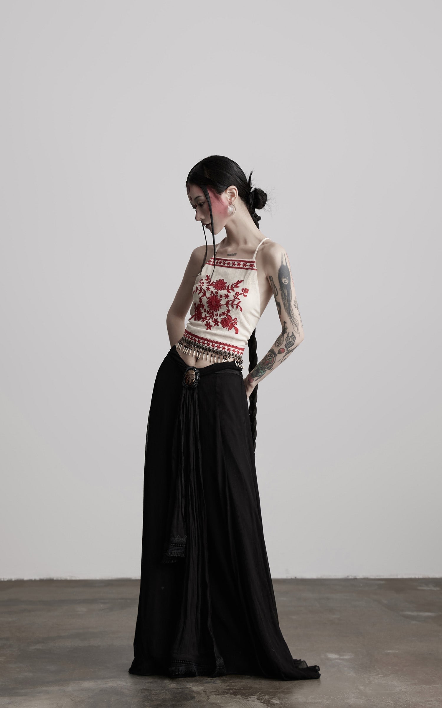 DOINDULGE Embroidered Halter Top with Floral Motif and Beaded Hem Detailing