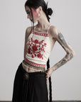 DOINDULGE Embroidered Halter Top with Floral Motif and Beaded Hem Detailing