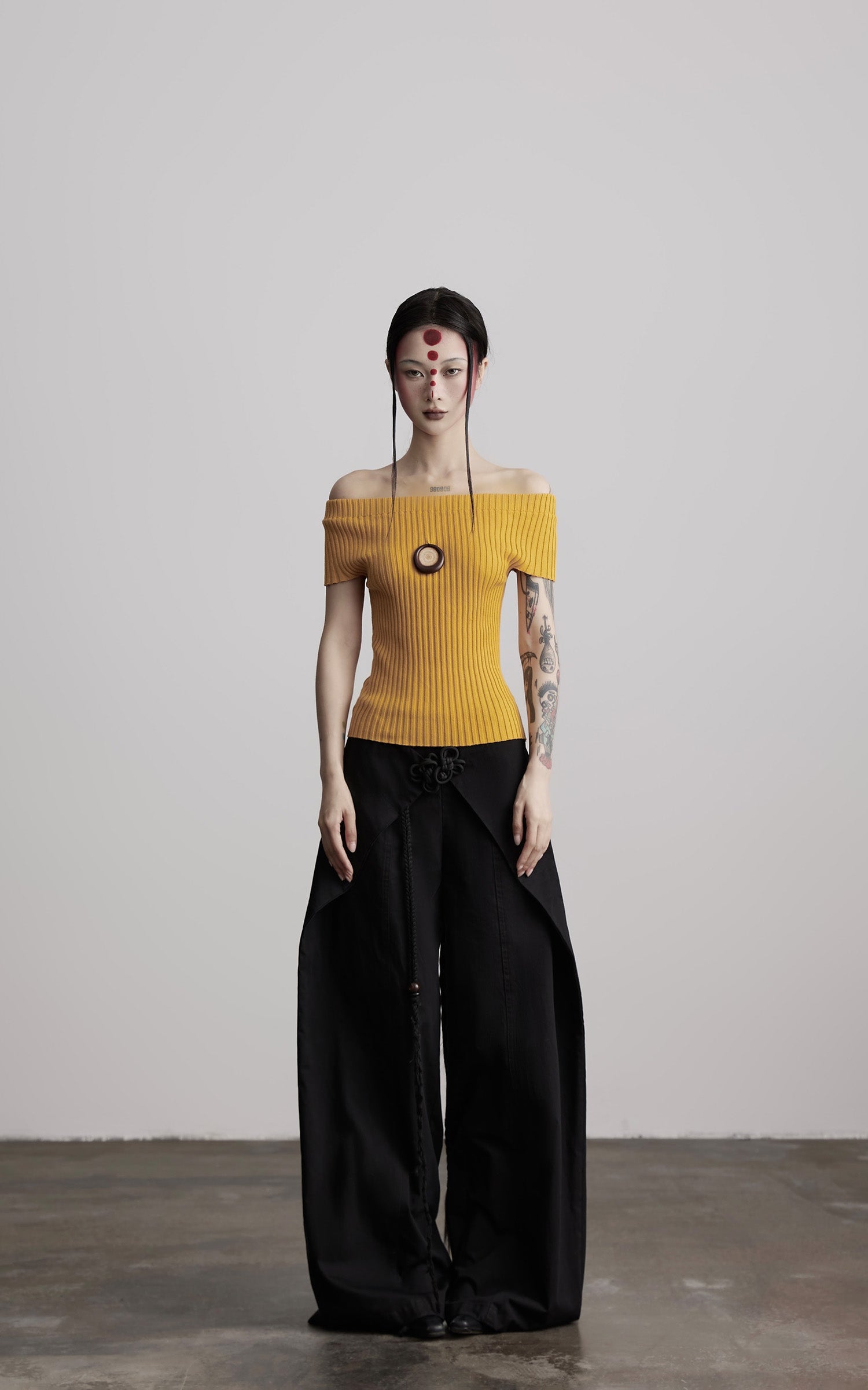 DOINDULGE Wide-Leg Wrap Pants with Knot Button and Beaded Tassel Detail