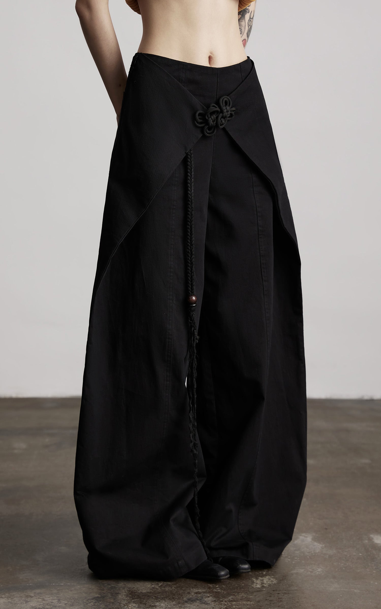 DOINDULGE Wide-Leg Wrap Pants with Knot Button and Beaded Tassel Detail
