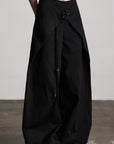 DOINDULGE Wide-Leg Wrap Pants with Knot Button and Beaded Tassel Detail