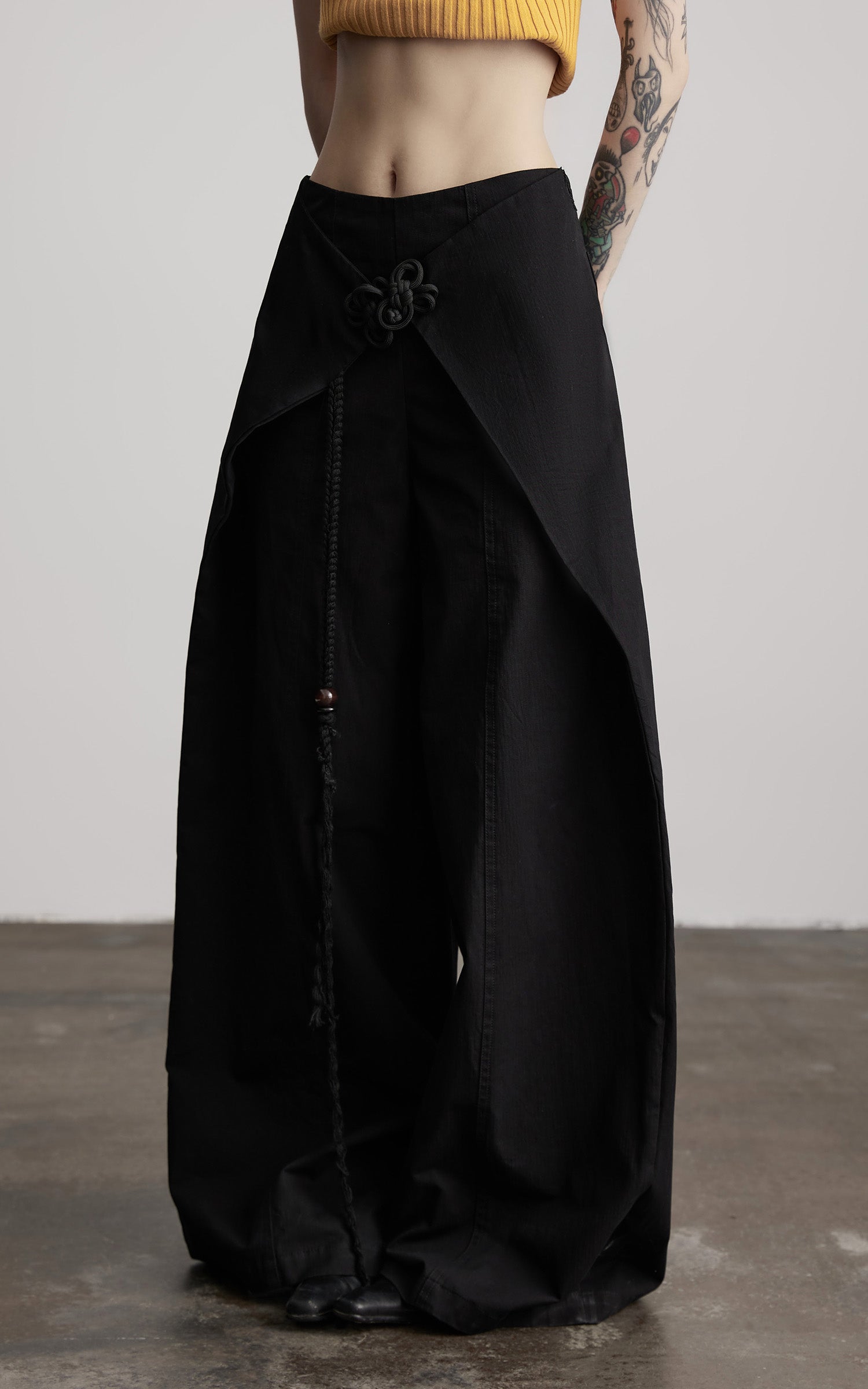 DOINDULGE Wide-Leg Wrap Pants with Knot Button and Beaded Tassel Detail