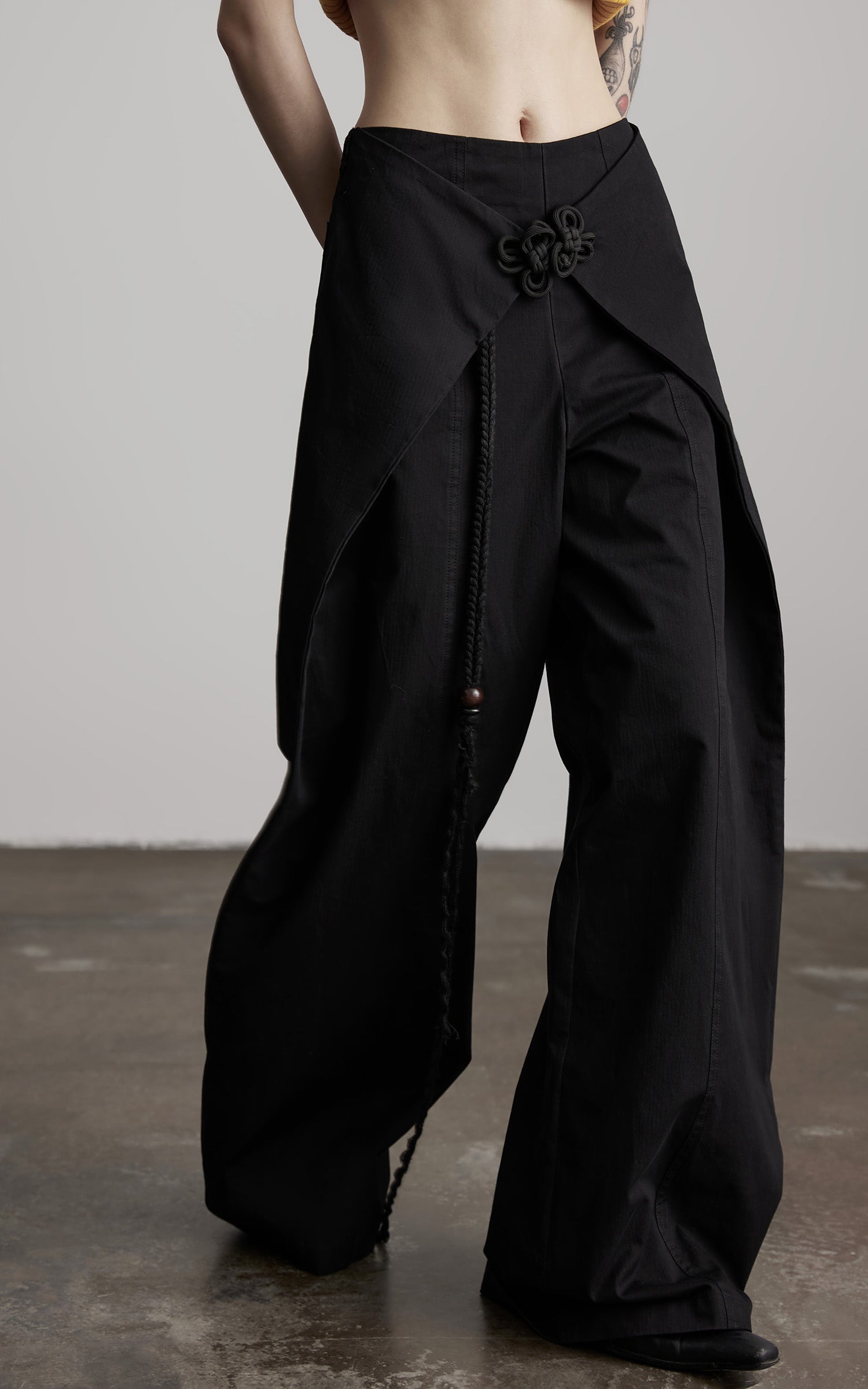 DOINDULGE Wide-Leg Wrap Pants with Knot Button and Beaded Tassel Detail