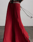 DOINDULGE Red Pleated Wide-Leg Skirt with Geometric Woven Waistband and Statement Buckle