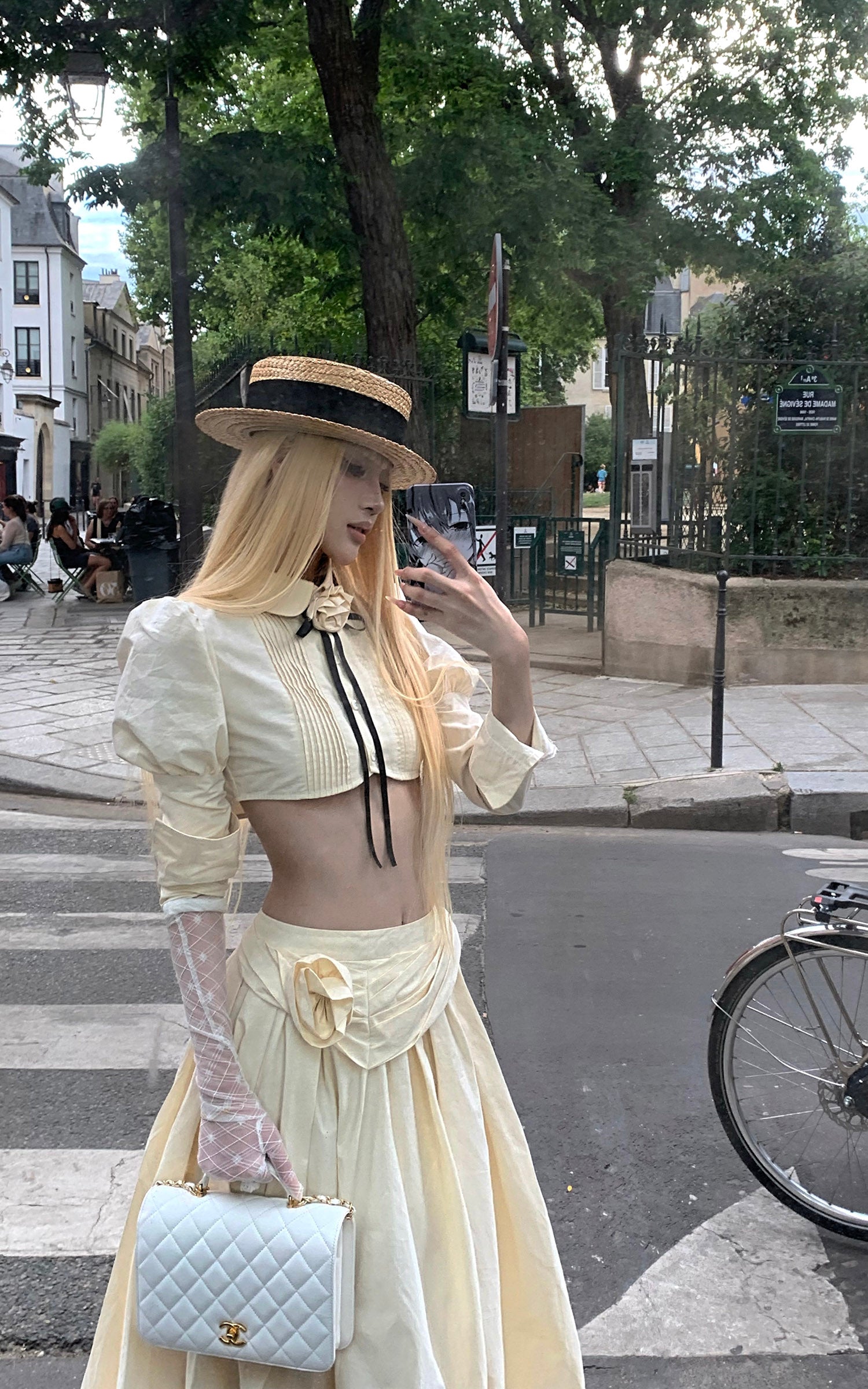 Rase le sol Cropped Puff-Sleeve Shirt with Pleated Front and Rosette Tie
