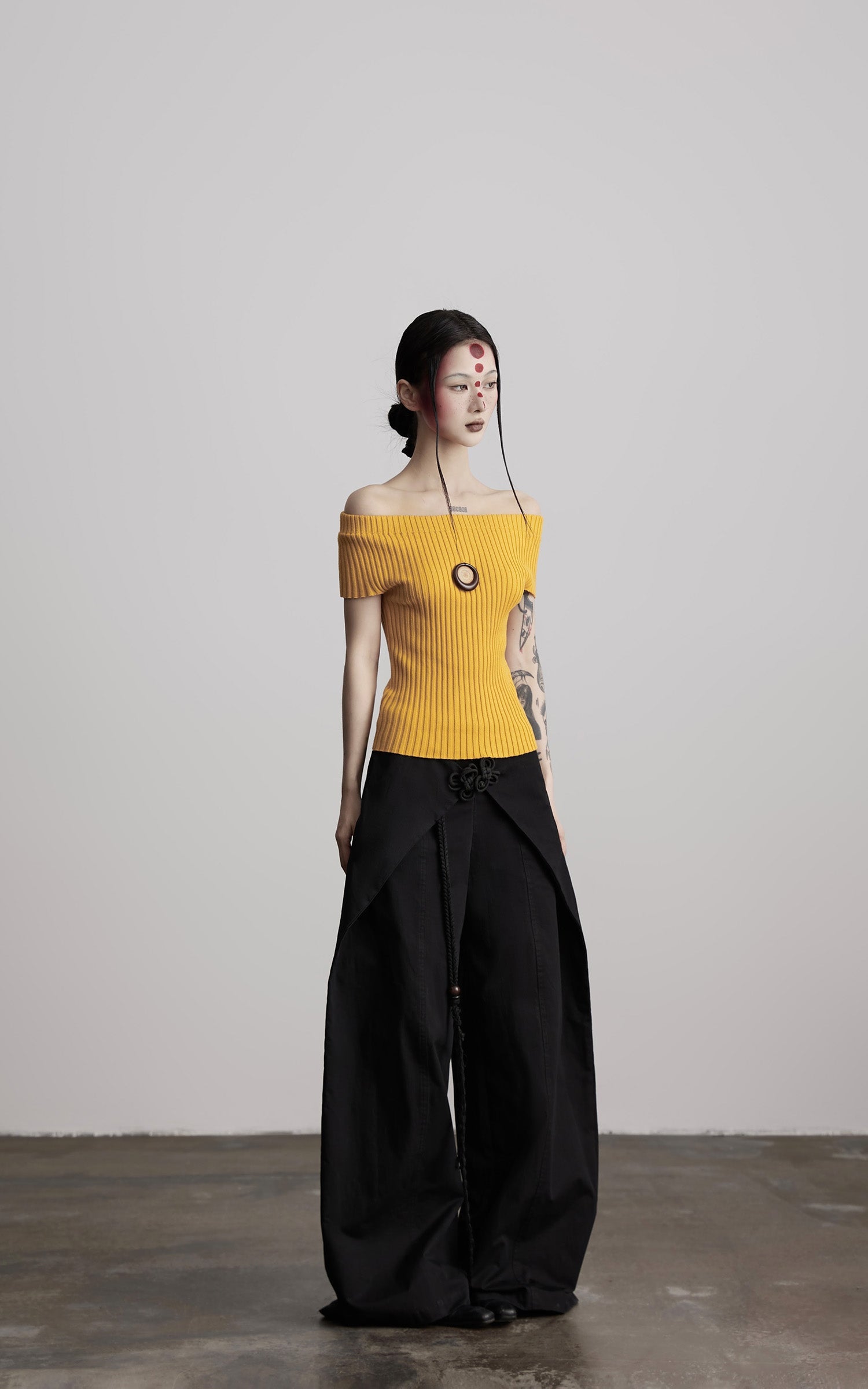 DOINDULGE Wide-Leg Wrap Pants with Knot Button and Beaded Tassel Detail