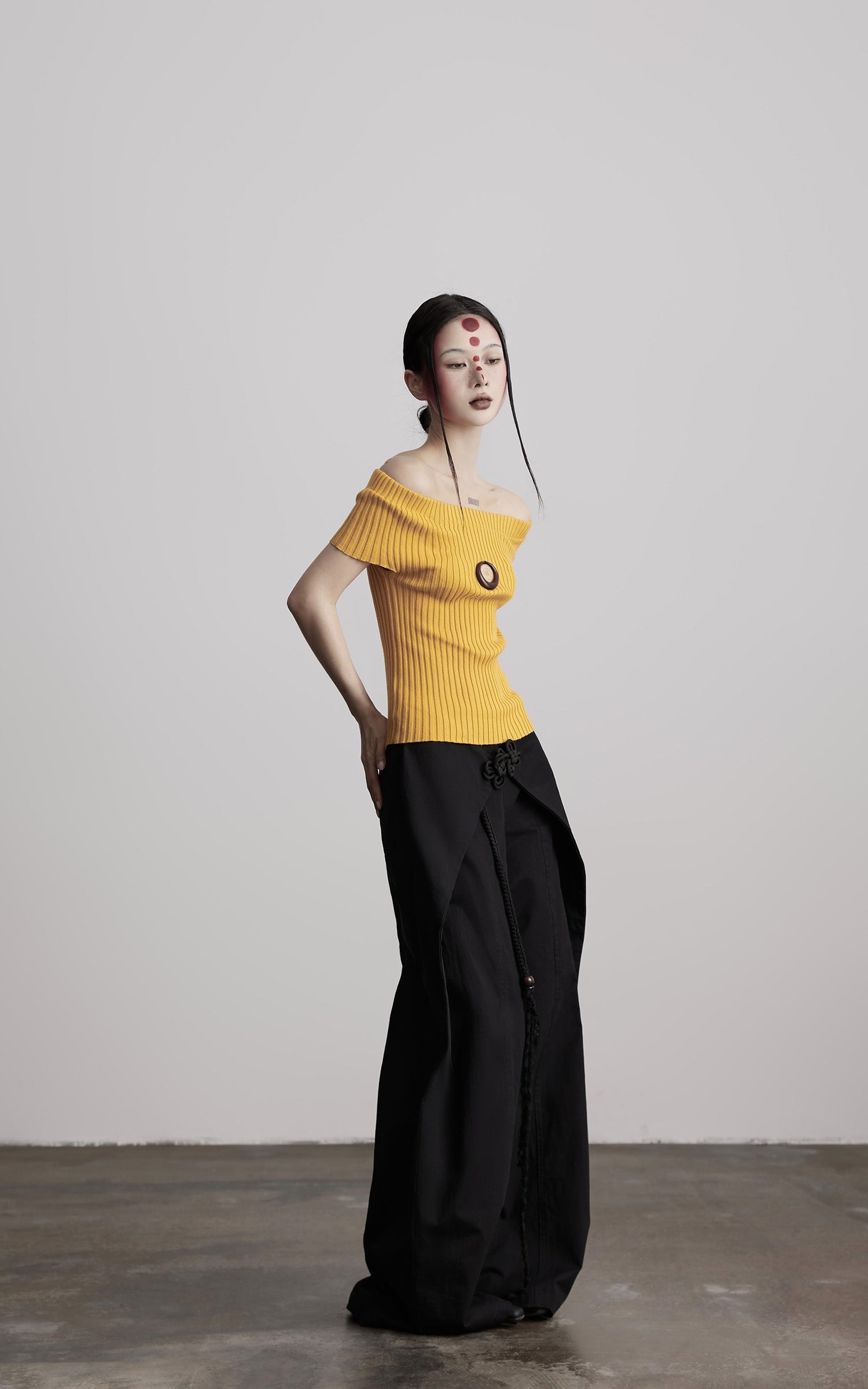 DOINDULGE Off-Shoulder Ribbed Knit Top with Wooden Medallion Detail