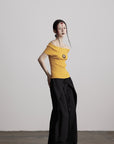 DOINDULGE Off-Shoulder Ribbed Knit Top with Wooden Medallion Detail