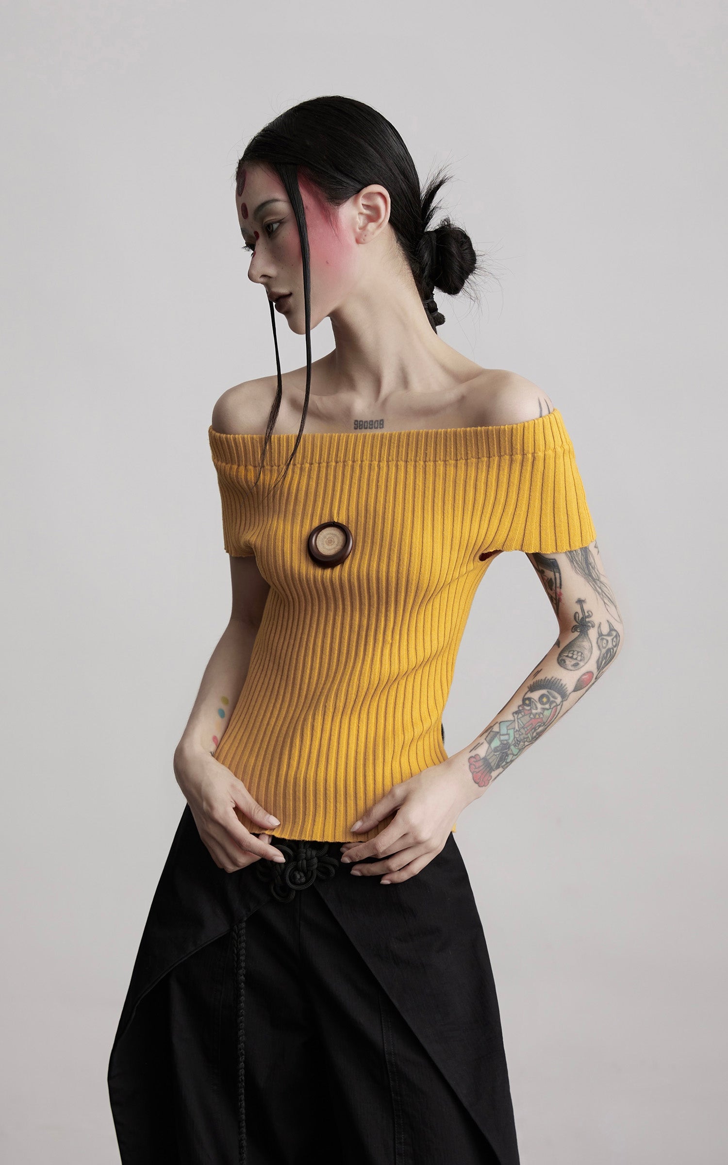 DOINDULGE Off-Shoulder Ribbed Knit Top with Wooden Medallion Detail