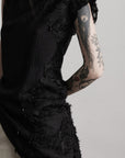 DOINDULGE Asymmetric Textured Sleeveless Top with Frayed and Beaded Detailing