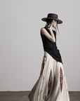 DOINDULGE Asymmetric Textured Sleeveless Top with Frayed and Beaded Detailing