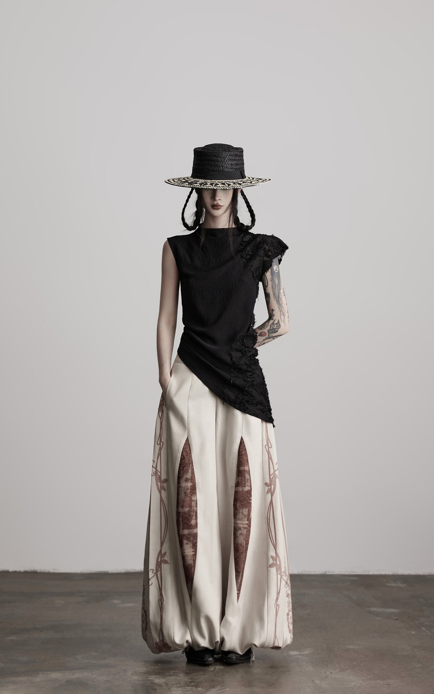 DOINDULGE Asymmetric Textured Sleeveless Top with Frayed and Beaded Detailing