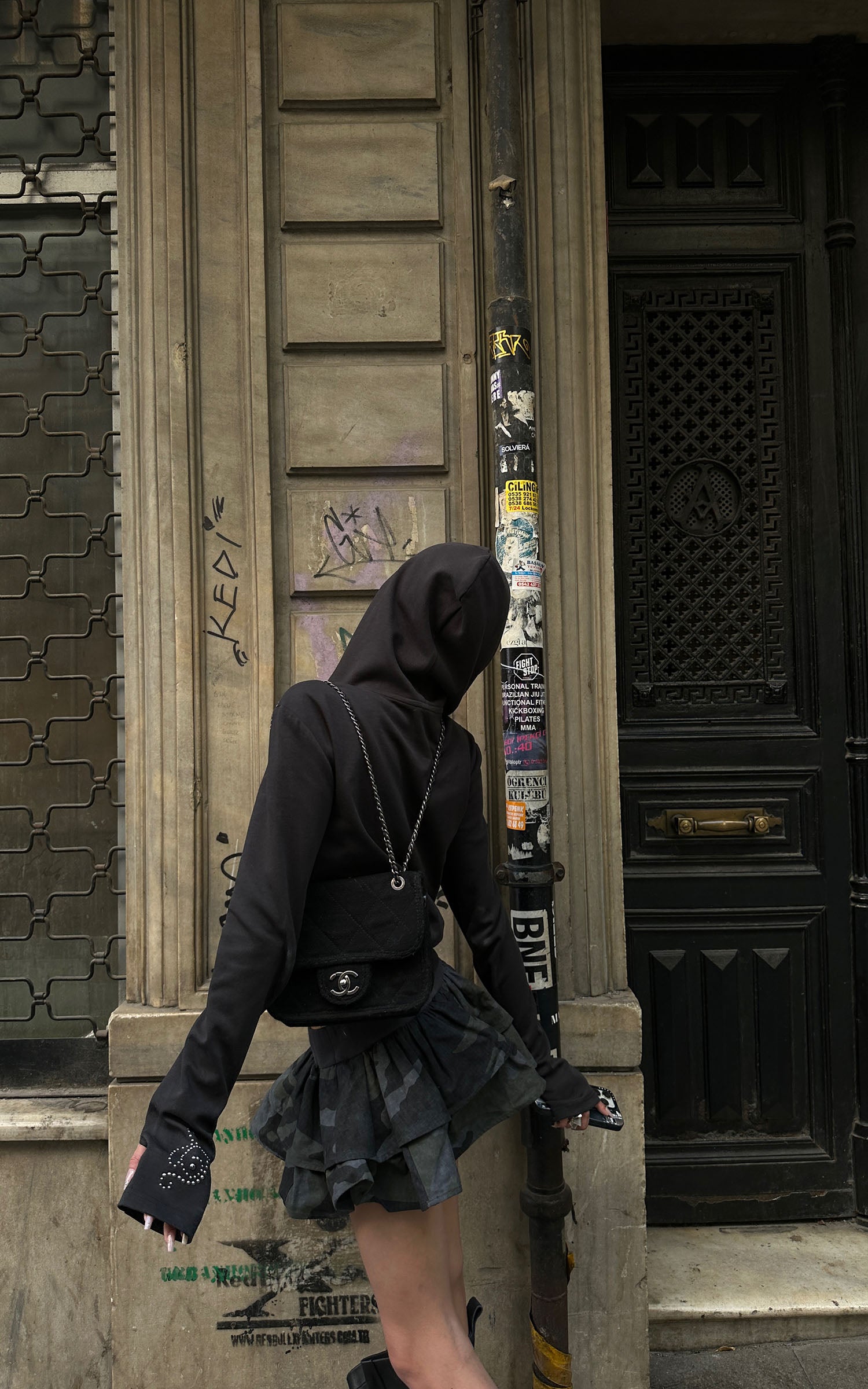 WARDEN EDGE Studded Zip-Up Hoodie with Spiral Embellishments and Extended Sleeves
