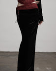 DOINDULGE Draped Velvet Skirt with Sheer Red Waist Detail