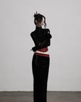 DOINDULGE Draped Velvet Skirt with Sheer Red Waist Detail