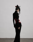 DOINDULGE Draped Velvet Skirt with Sheer Red Waist Detail