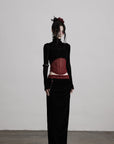 DOINDULGE Draped Velvet Skirt with Sheer Red Waist Detail