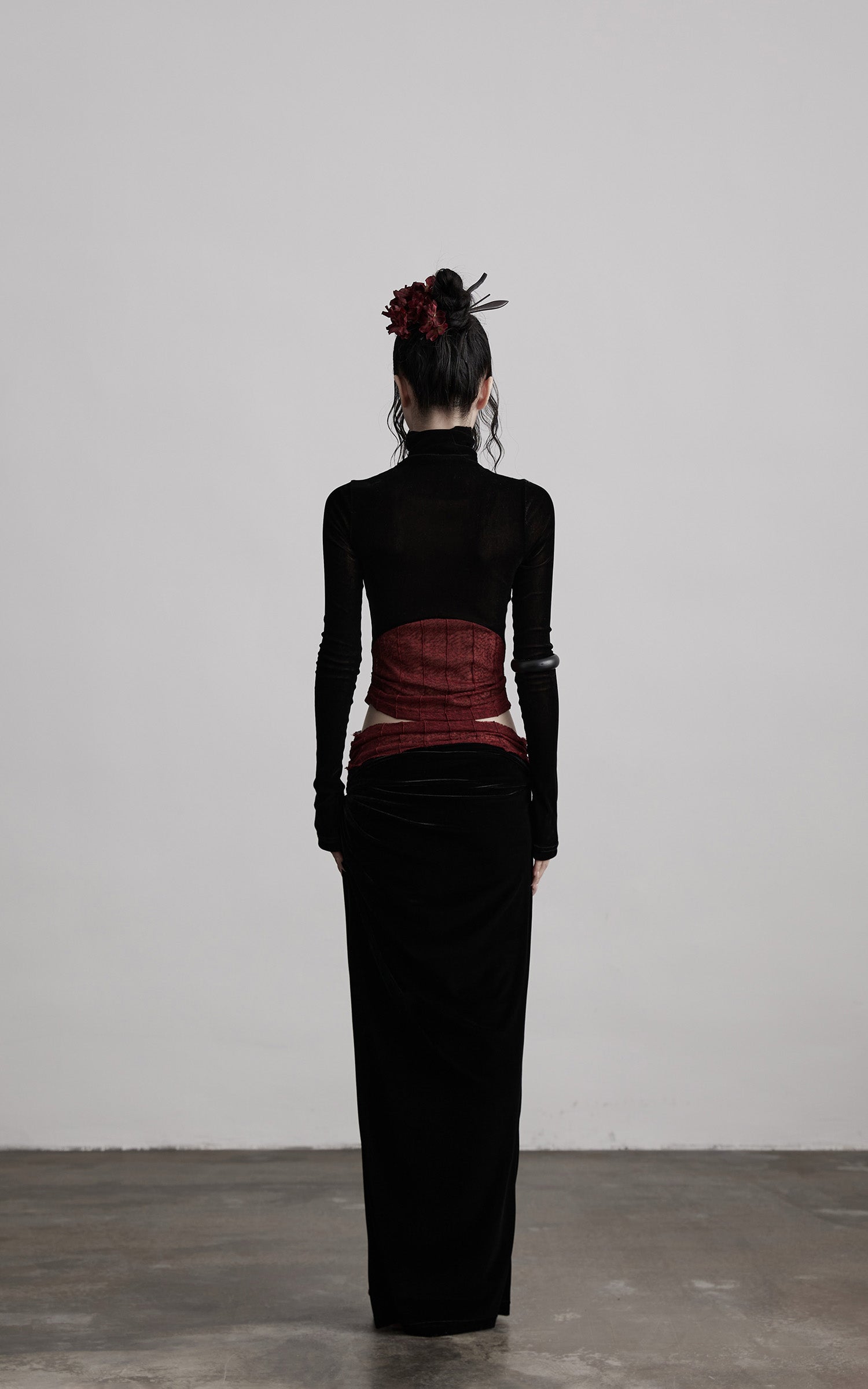 DOINDULGE Draped Velvet Skirt with Sheer Red Waist Detail