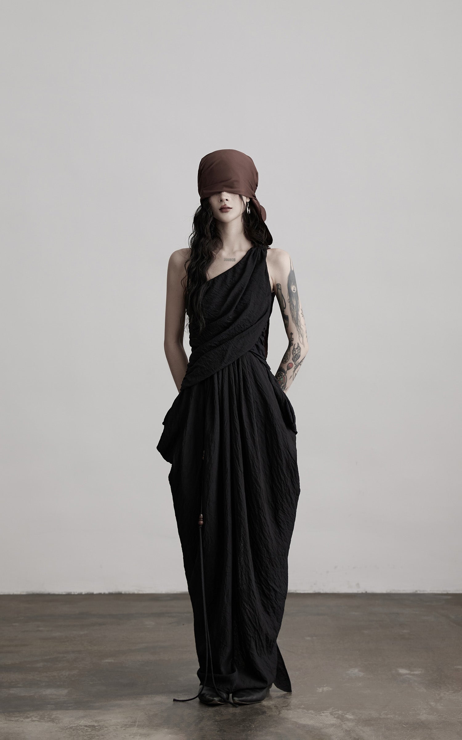 DOINDULGE Asymmetric Draped Maxi Dress with Textured Fabric and Wooden Bead Detail