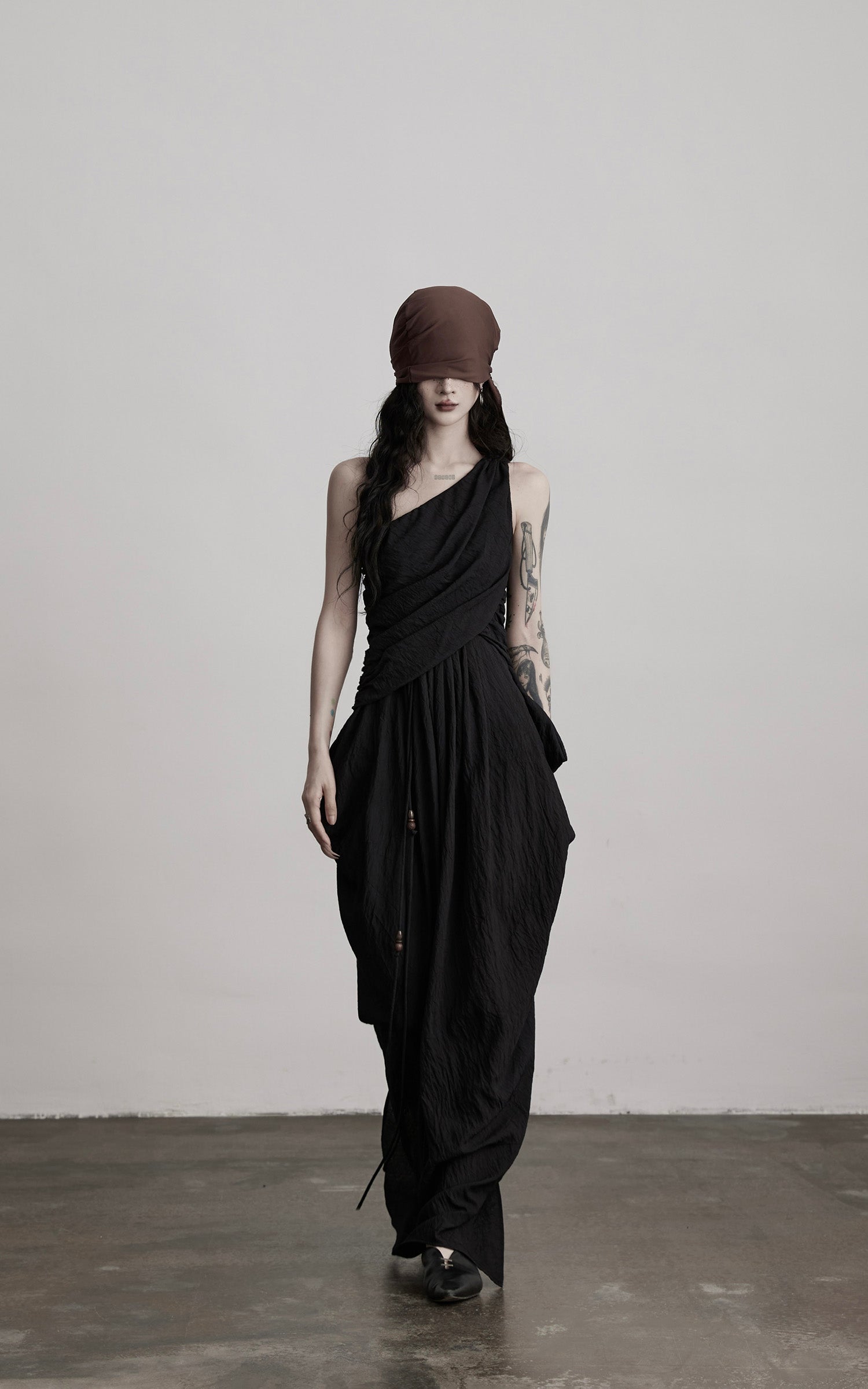 DOINDULGE Asymmetric Draped Maxi Dress with Textured Fabric and Wooden Bead Detail