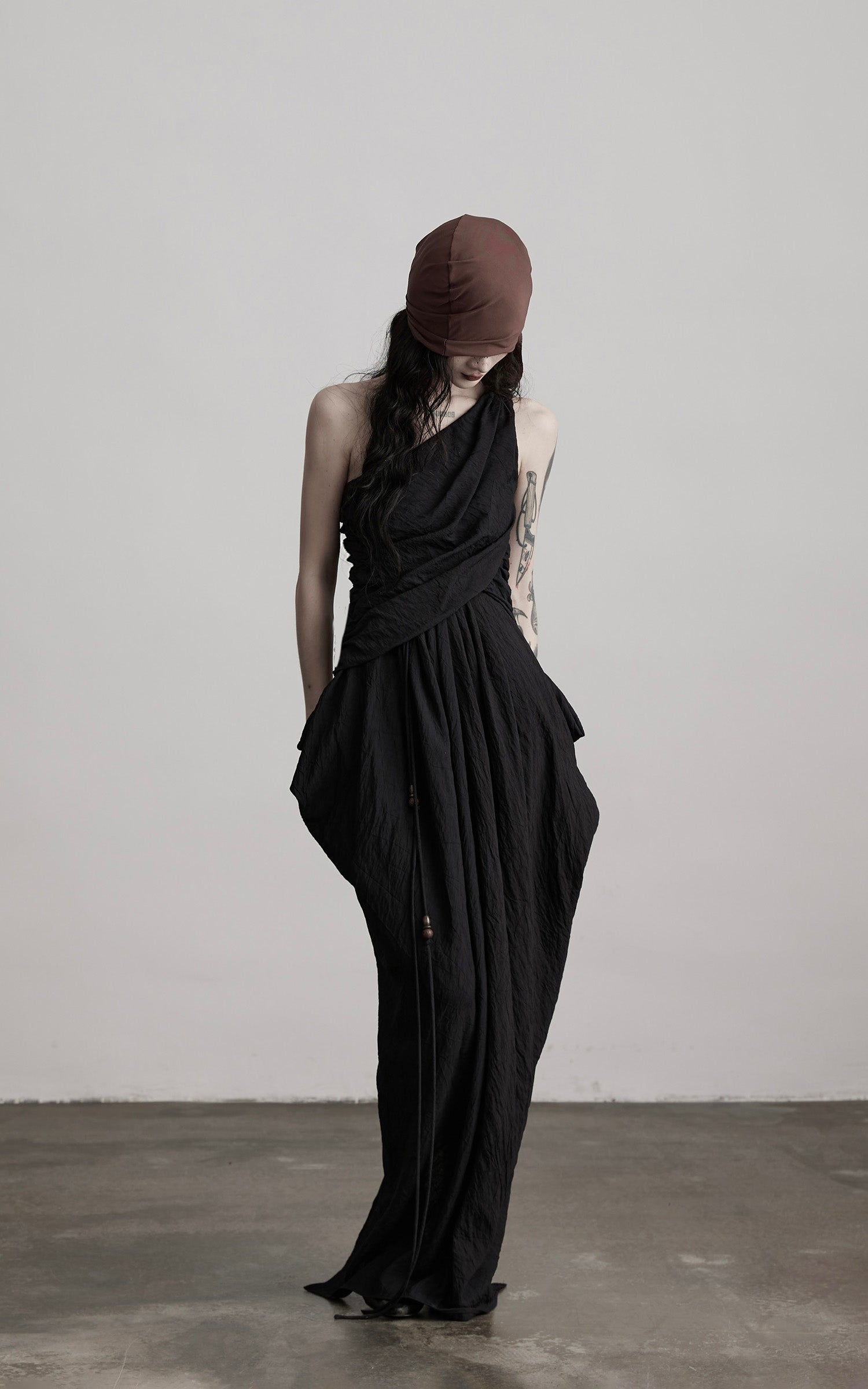 DOINDULGE Asymmetric Draped Maxi Dress with Textured Fabric and Wooden Bead Detail