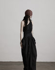 DOINDULGE Asymmetric Draped Maxi Dress with Textured Fabric and Wooden Bead Detail