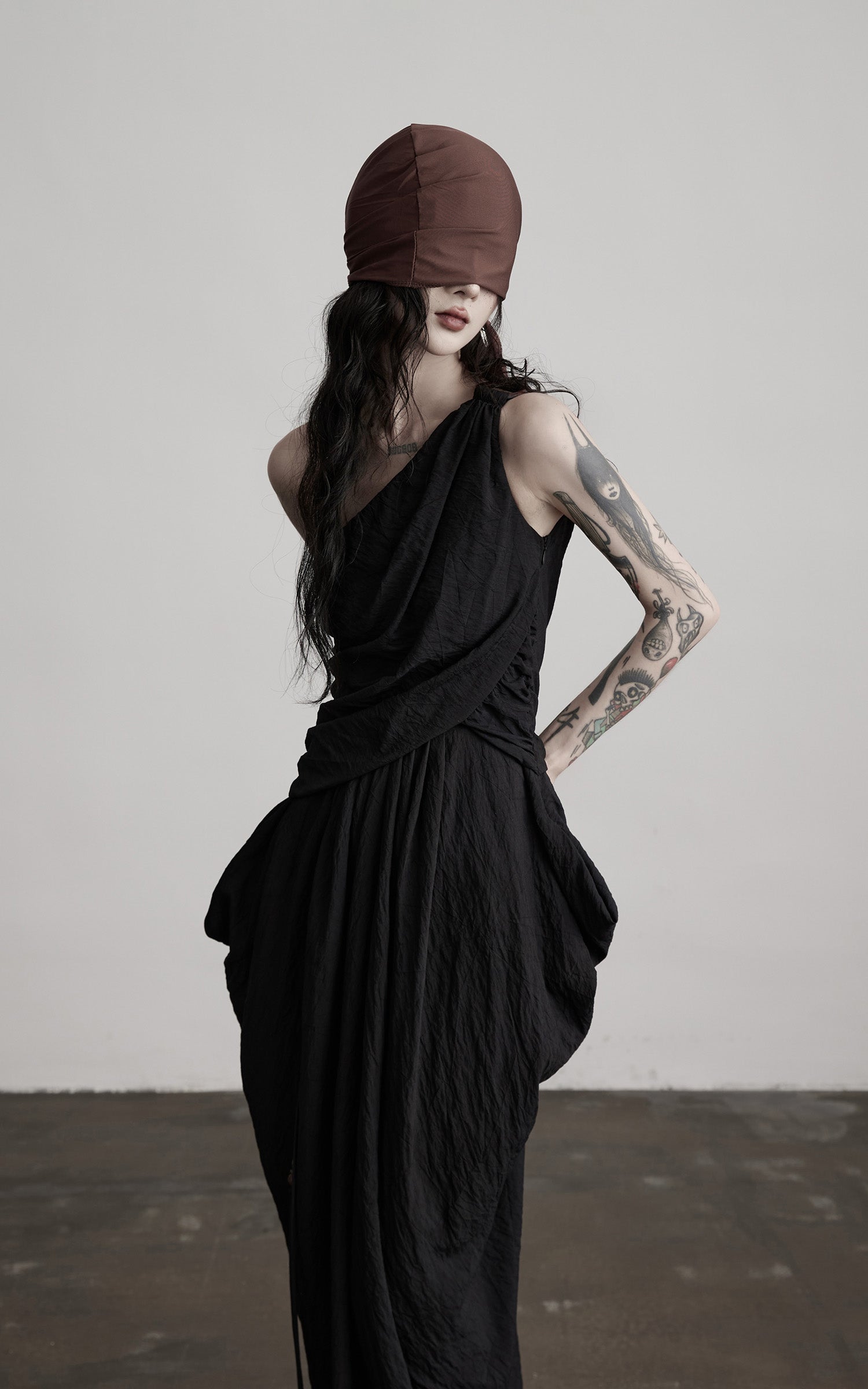 DOINDULGE Asymmetric Draped Maxi Dress with Textured Fabric and Wooden Bead Detail