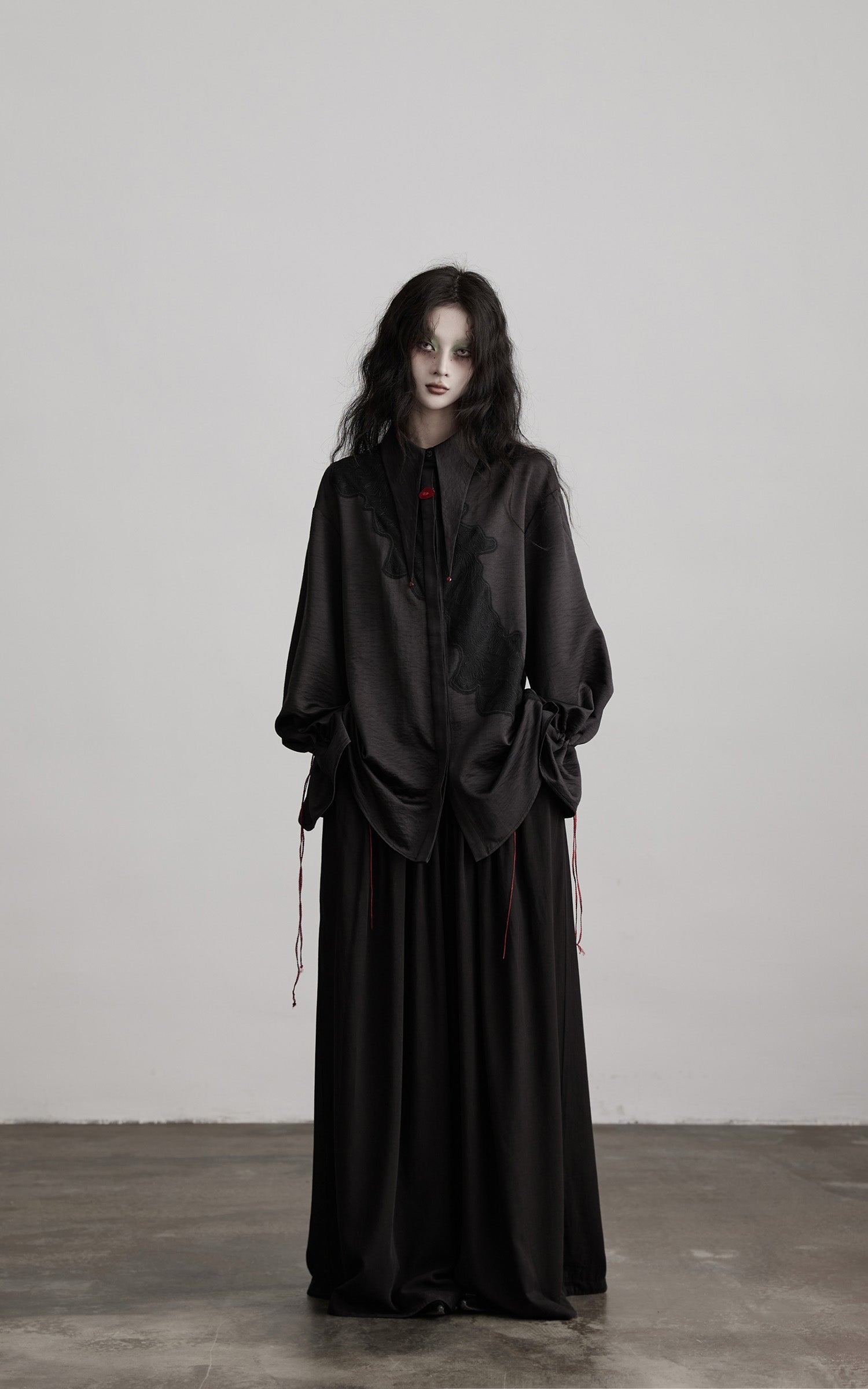 DOINDULGE Wide-Leg Trousers with Red Stitch Detailing