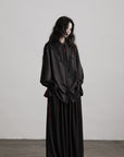 DOINDULGE Wide-Leg Trousers with Red Stitch Detailing