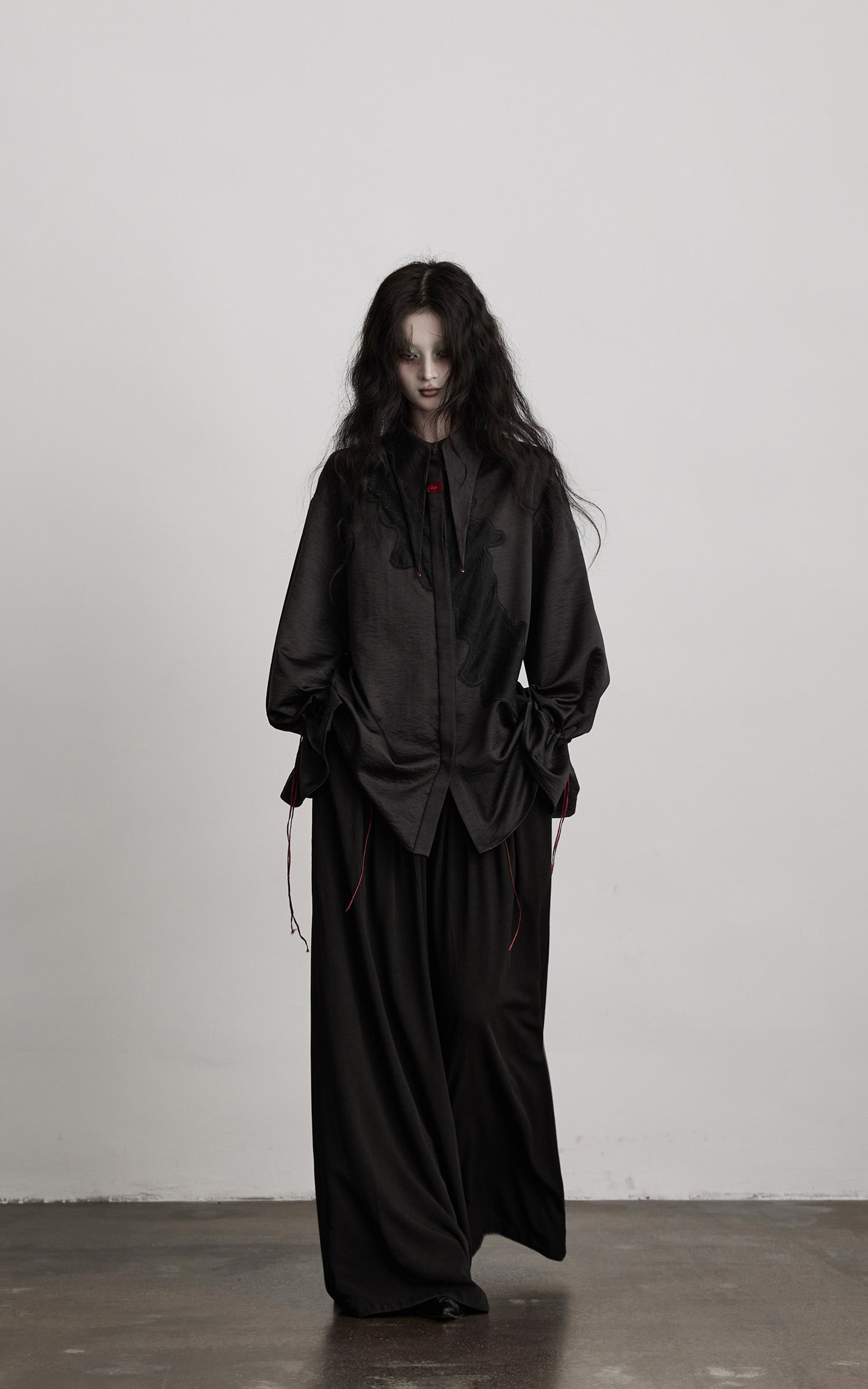 DOINDULGE Wide-Leg Trousers with Red Stitch Detailing