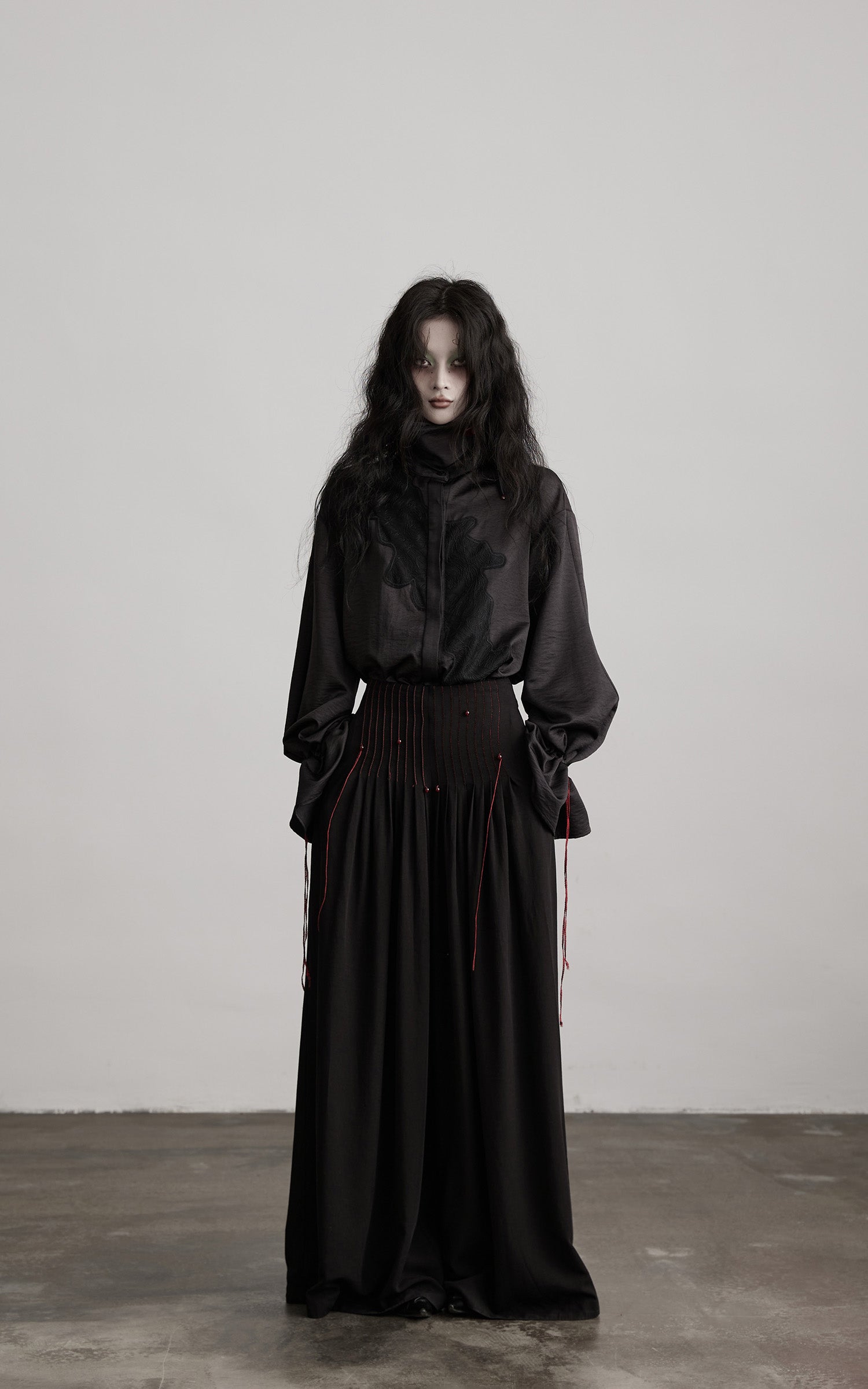 DOINDULGE Wide-Leg Trousers with Red Stitch Detailing