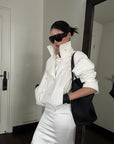 ROVENTE Cropped Double-Breasted Trench Jacket with Structured Lapels and Buckled Cuffs