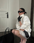 ROVENTE Cropped Double-Breasted Trench Jacket with Structured Lapels and Buckled Cuffs
