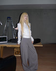 Rase le sol Pantalon large plissé taille haute