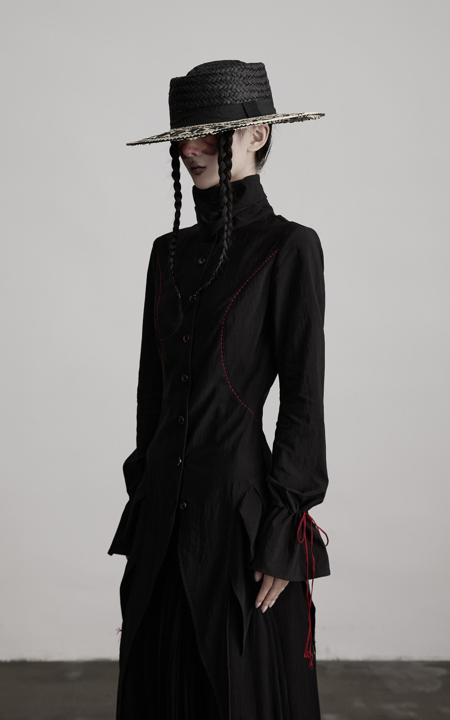 DOINDULGE Asymmetric Hem Shirt with Red Stitch Detail