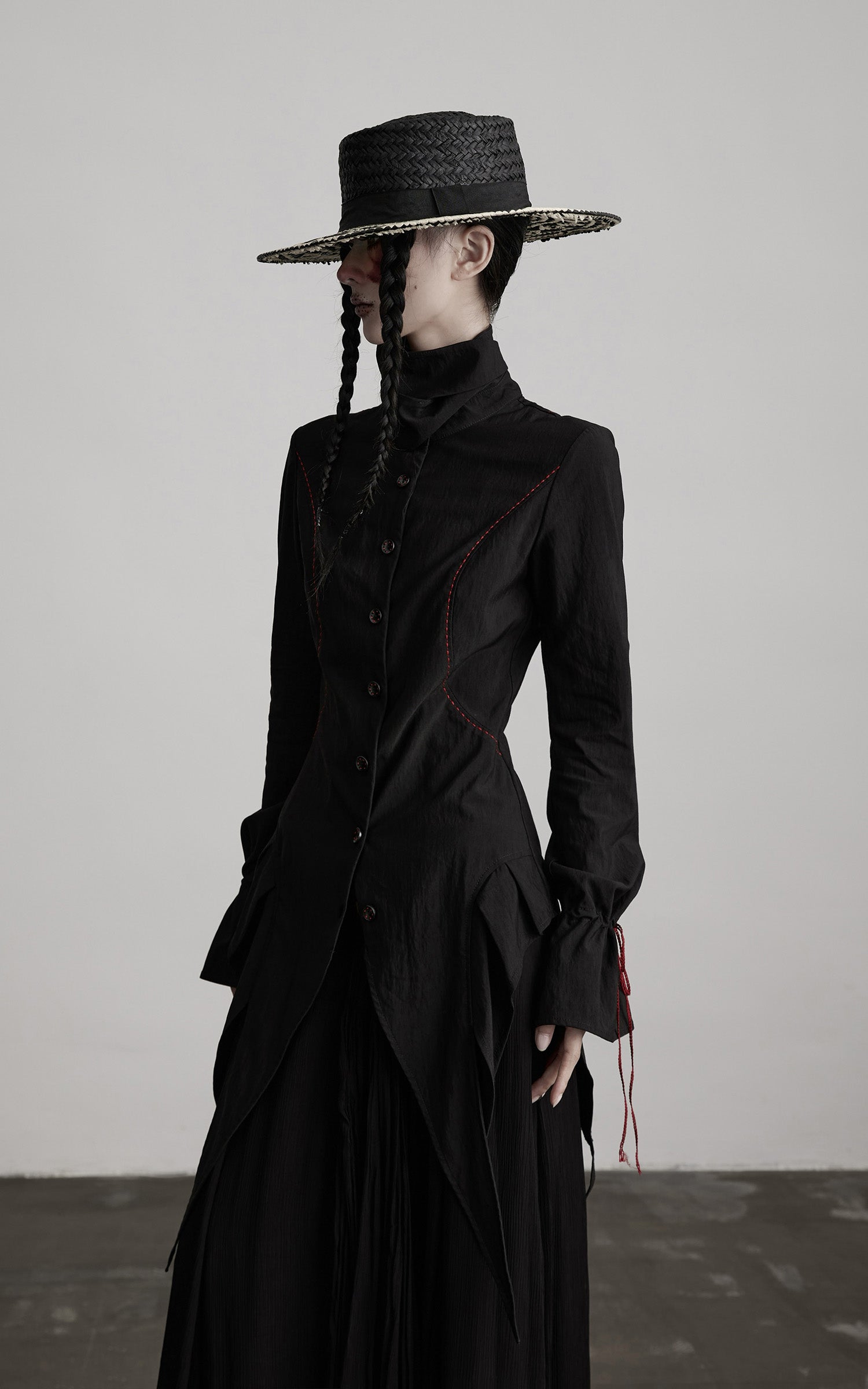 DOINDULGE Asymmetric Hem Shirt with Red Stitch Detail