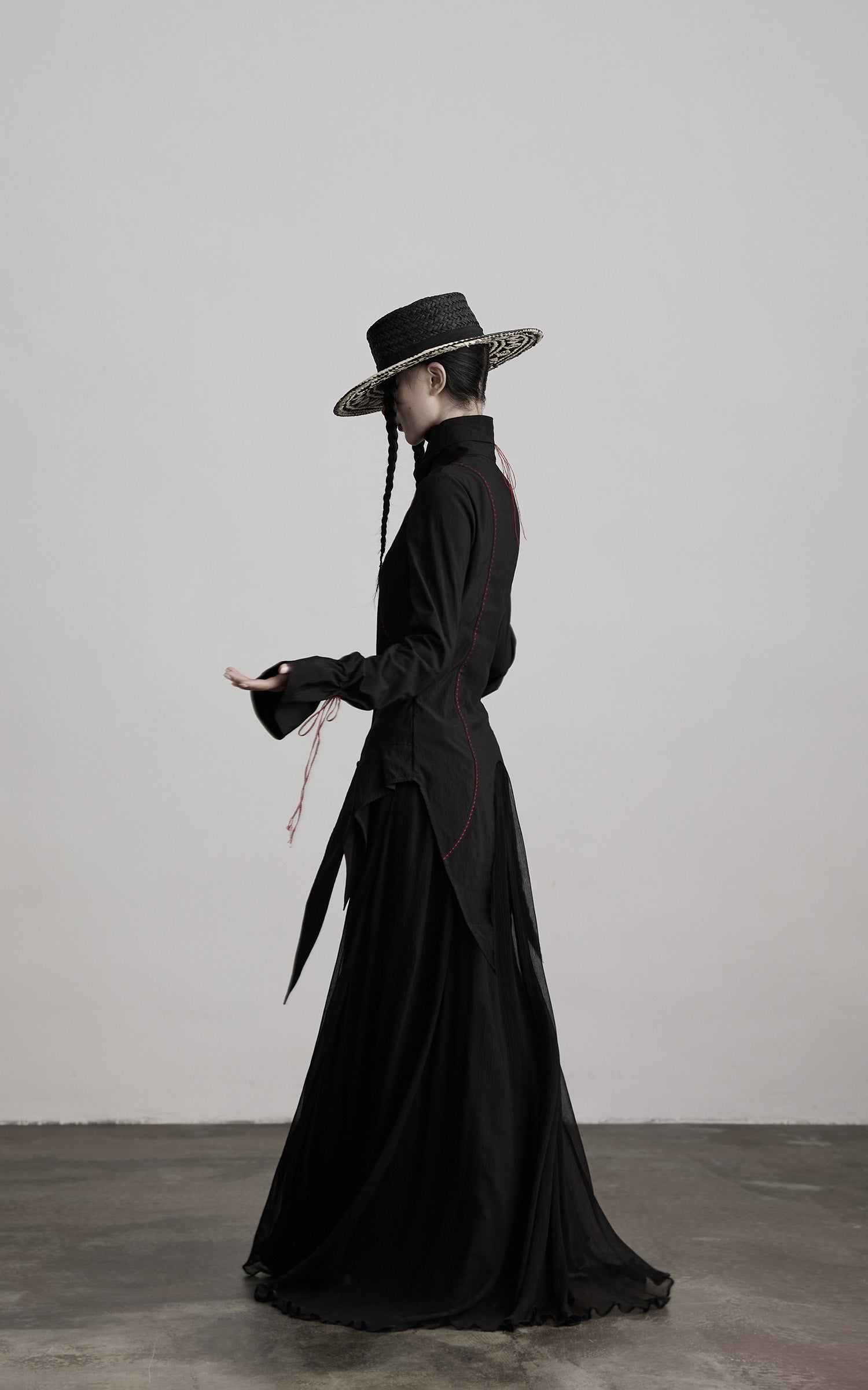 DOINDULGE Asymmetric Hem Shirt with Red Stitch Detail