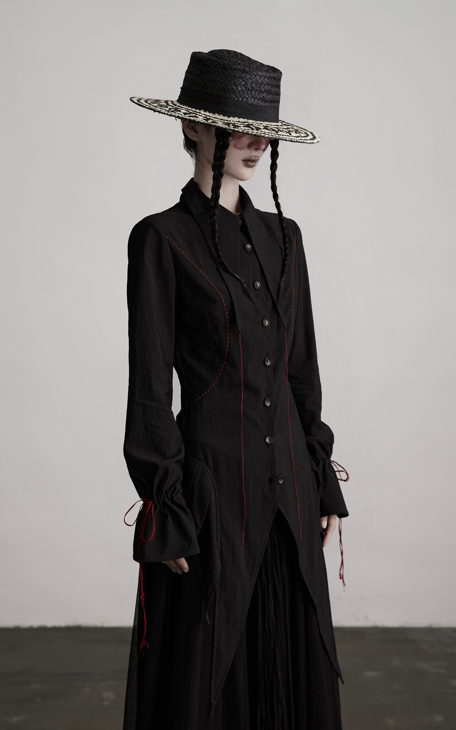 DOINDULGE Asymmetric Hem Shirt with Red Stitch Detail