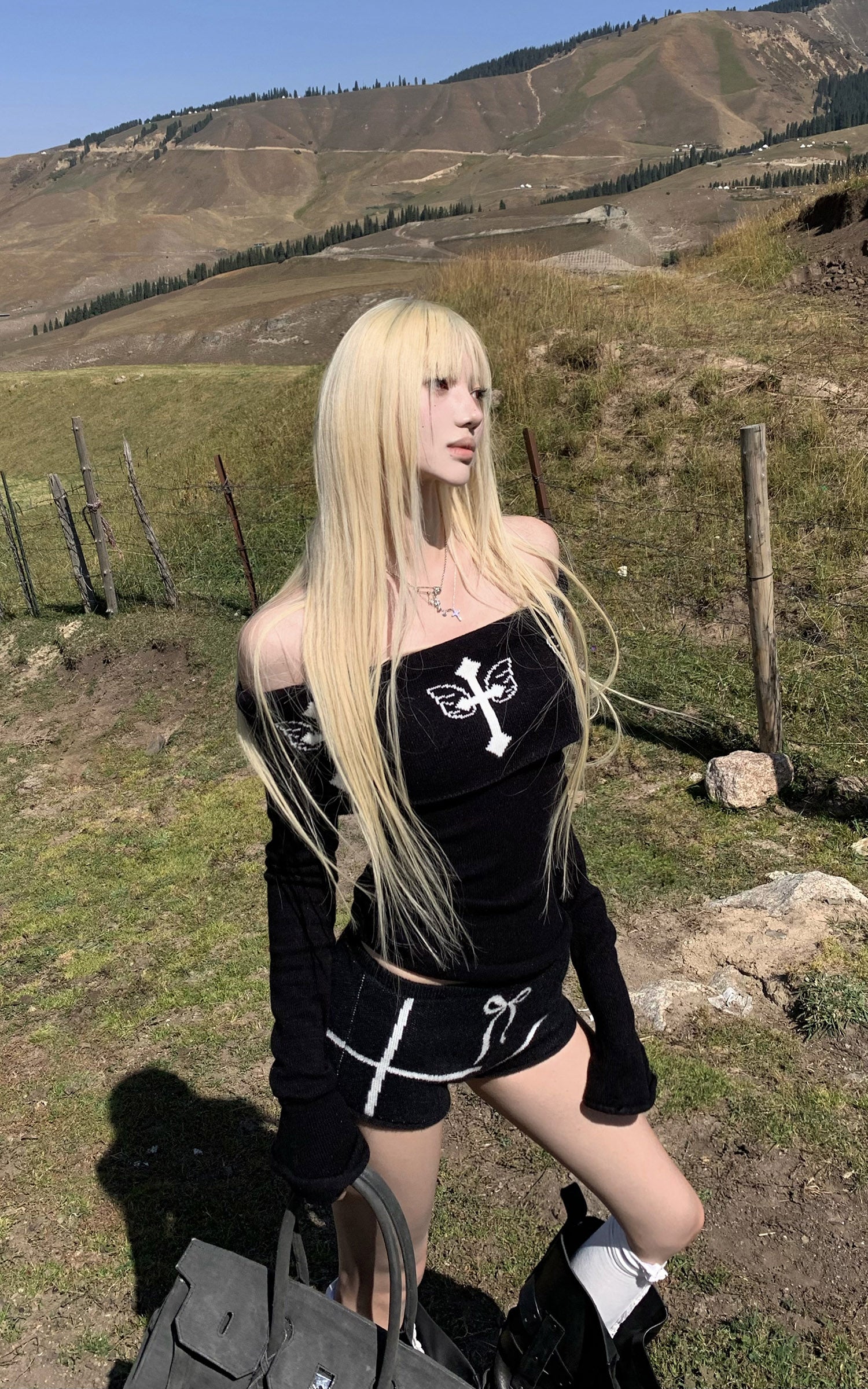 Rase le sol Black Knit Set with Cross Butterfly Motif