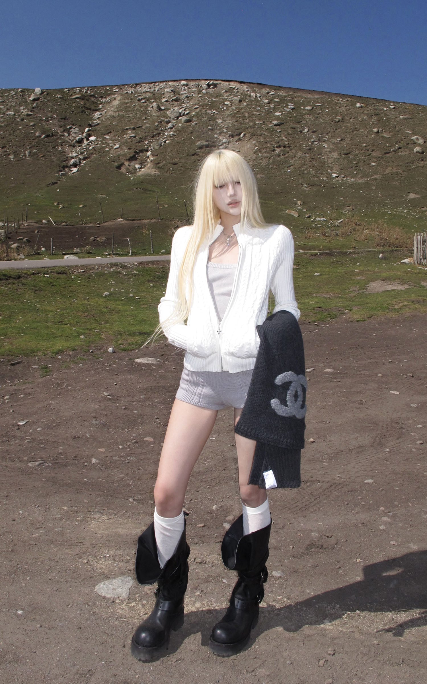 Rase le sol High Neck Cable Knit Cardigan with Sculpted Fit and Cross Zipper Detail
