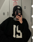 WARDEN EDGE Oversized Knit Sweater with Textured Number Motif