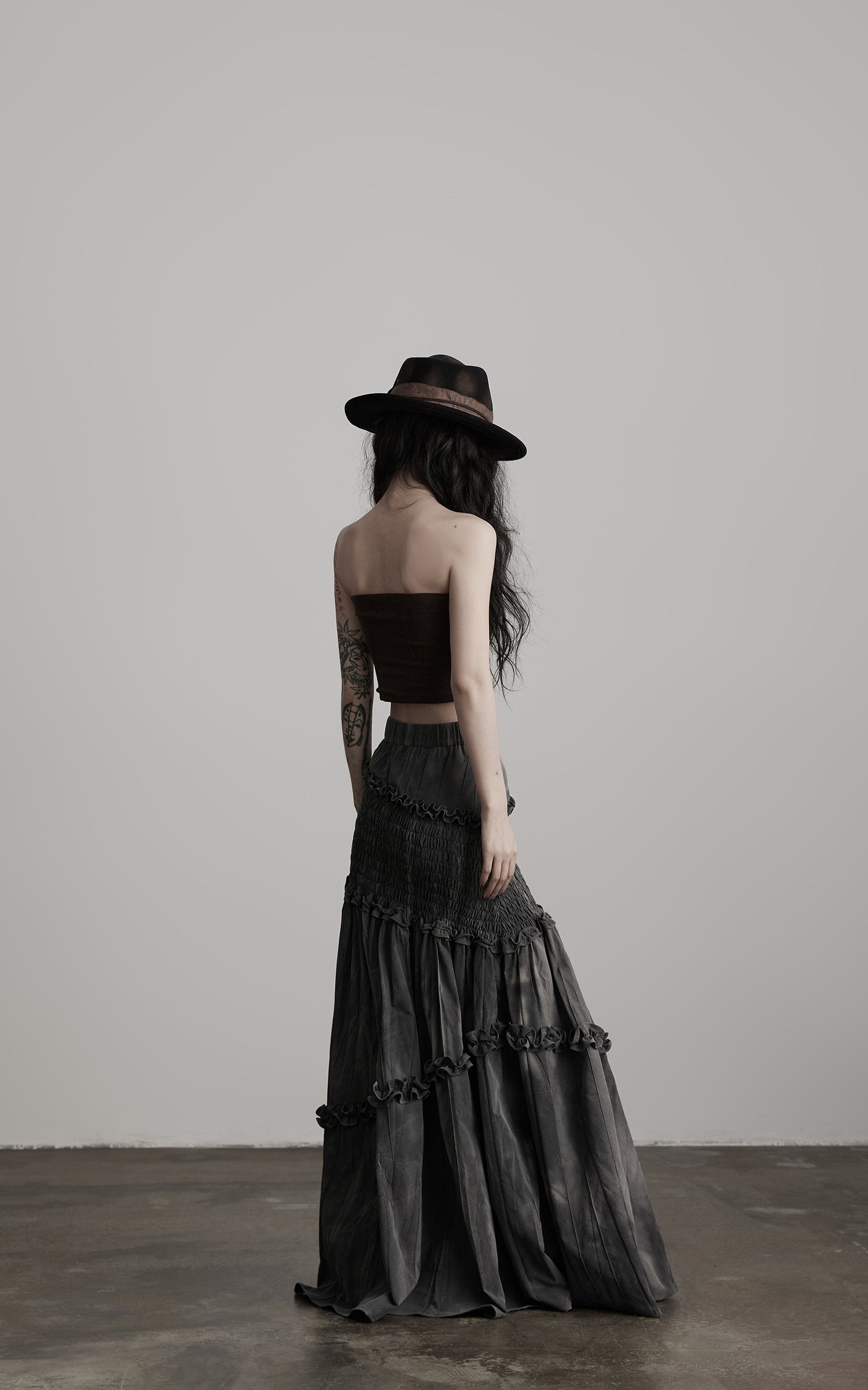 DOINDULGE Asymmetric Smocked Maxi Skirt