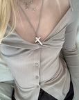 Rase le sol Twisted Knot Ribbed Knit Top with Open Neckline