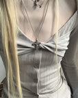 Rase le sol Twisted Knot Ribbed Knit Top with Open Neckline