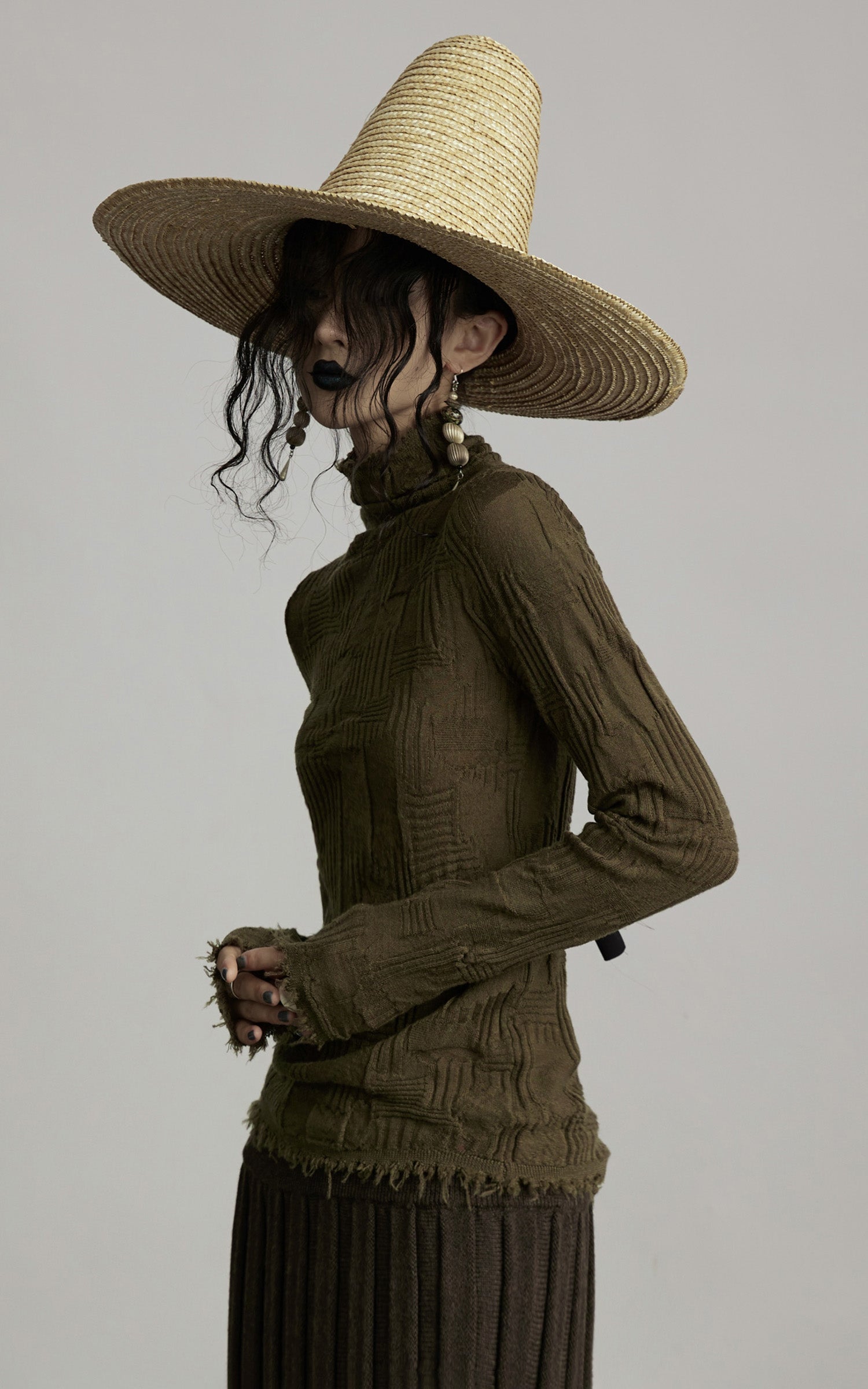 DOINDULGE Textured Distressed Knit Top