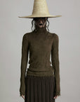 DOINDULGE Textured Distressed Knit Top