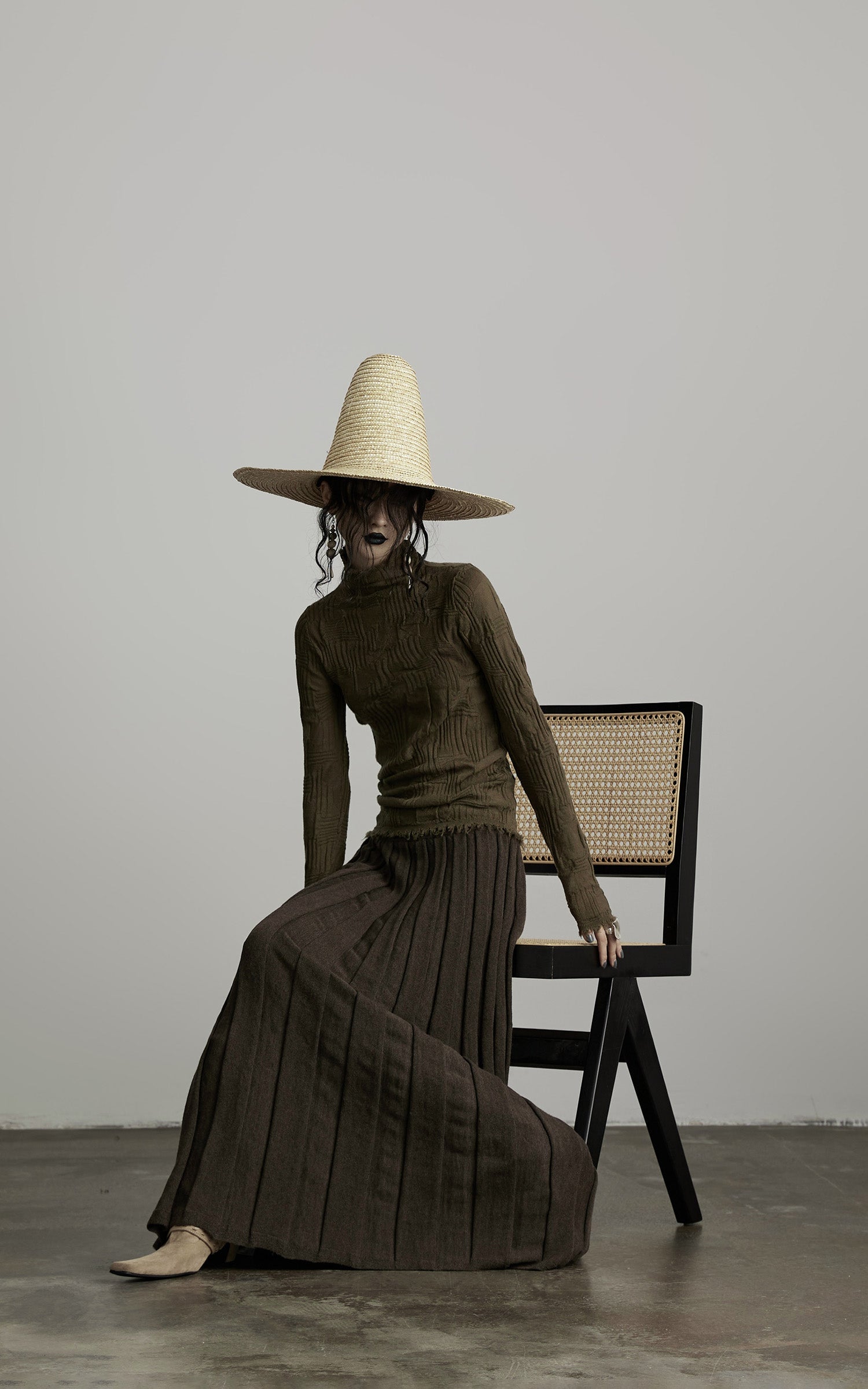 DOINDULGE Textured Distressed Knit Top