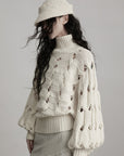 DOINDULGE Braided Void Turtleneck Sweater