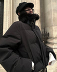 Veste matelassée courte noire avec col en fausse fourrure
